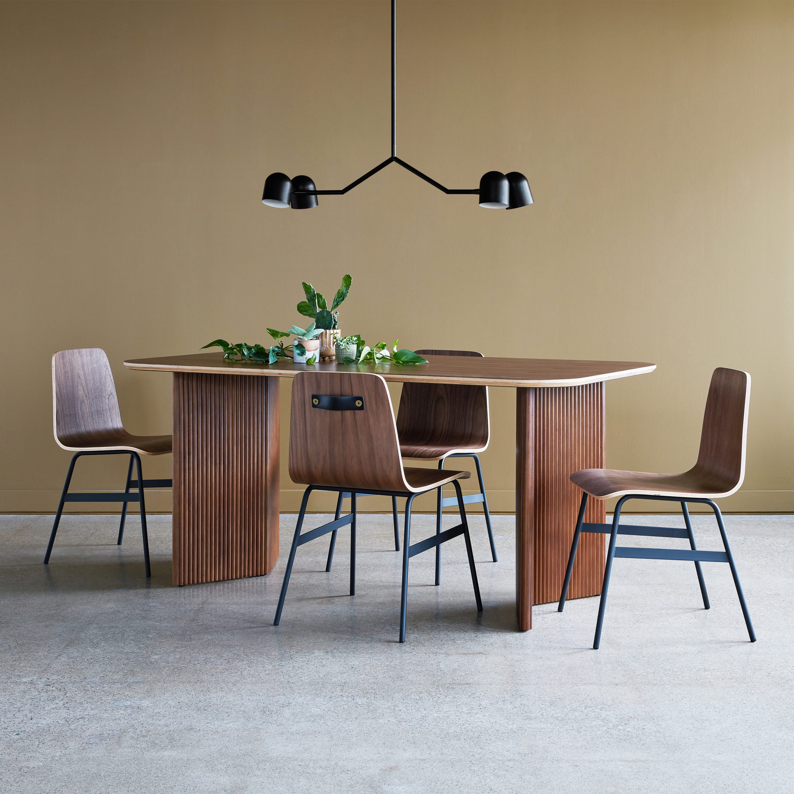 Atwell Rectangular Dining Table in Walnut paired with Lecture Dining Chairs